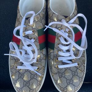 Gucci Beige and Gold Patterned Sneakers with Red and Green Accents